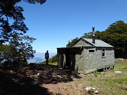 Simon outside Fosters Hut
Photographer;&nbsp;Brian
2017-12-02&nbsp;12.01.38;&nbsp;Metadata time: '2017 Dec 02 12:01'
Original size:&nbsp;4,000 x 3,000; 4,842 kB
Filename: 2017-12-02 12.01.38 P1010046 Brian - Simon outside Fosters Hut.jpeg