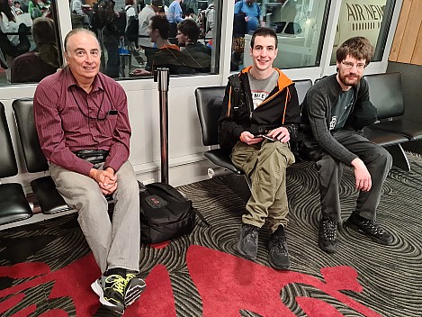 Jim, Adrian, and Kevin in the Auckland departure lounge
Photographer;&nbsp;Simon
2024-03-01&nbsp;05.44.44;&nbsp;Metadata time: '2024 Mar 01 09:44'
Original size:&nbsp;8,688 x 6,516; 7,595 kB;&nbsp;cr
Filename: 2024-03-01 05.44.44 S20+ Simon - Jim, Adrian, and Kevin in the Auckland departure lounge_cr.jpg