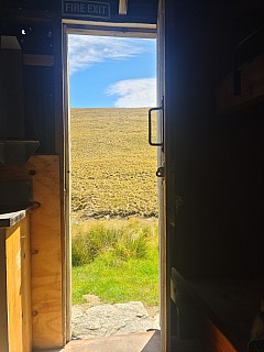 Looking out the door of Nicholsons Hut
Photographer;&nbsp;Simon
2022-12-29&nbsp;11.23.10;&nbsp;Metadata time: '2022 Dec 29 11:23'
Original size:&nbsp;6,928 x 9,248; 15,640 kB
Filename: 2022-12-29 11.23.10 S20+ Simon - looking out the door of Nicholsons Hut.jpeg