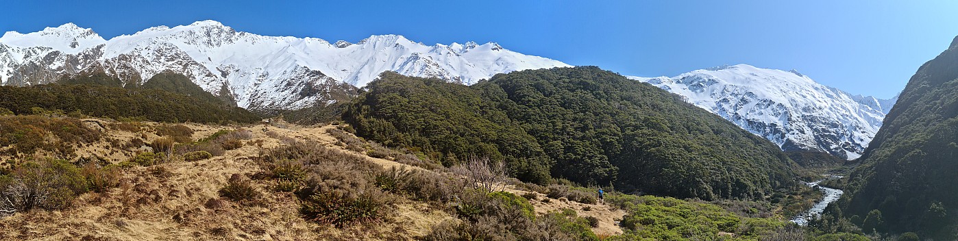 Brian heading for the spur with Brodrick Hut
Photographer;&nbsp;Simon
2024-09-30&nbsp;11.34.39;&nbsp;Metadata time: '2024 Sept 30 11:34'
Original size:&nbsp;25,241 x 6,356; 43,935 kB;&nbsp;stitch
Filename: 2024-09-30 11.34.39 S20+ Simon - Brian heading for the spur with Brodrick Hut_stitch.jpg