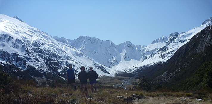 Brian, Simon, and Philip behind Brodrick Hut
Photographer;&nbsp;Philip
2024-09-30&nbsp;12.33.08;&nbsp;Metadata time: '2024 Sept 30 12:33'
Original size:&nbsp;4,320 x 2,137; 2,736 kB;&nbsp;cr
Filename: 2024-09-30 12.33.08 P1070597 Philip - Brian, Simon, and Philip behind Brodrick Hut_cr.jpg